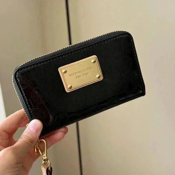 Michael Kors Black Wristlet with Gold Accents - Picture 3 of 14
